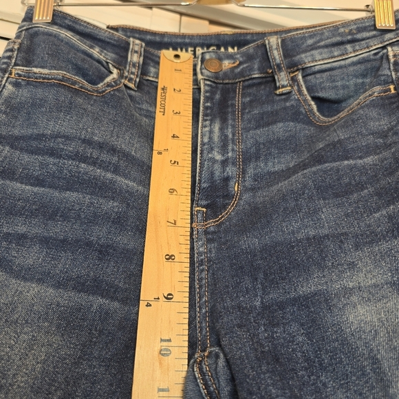 AMERICAN EAGLE Next Level Super High Rise Jegging Distressed Blue Jeans Women 4R - Picture 9 of 11